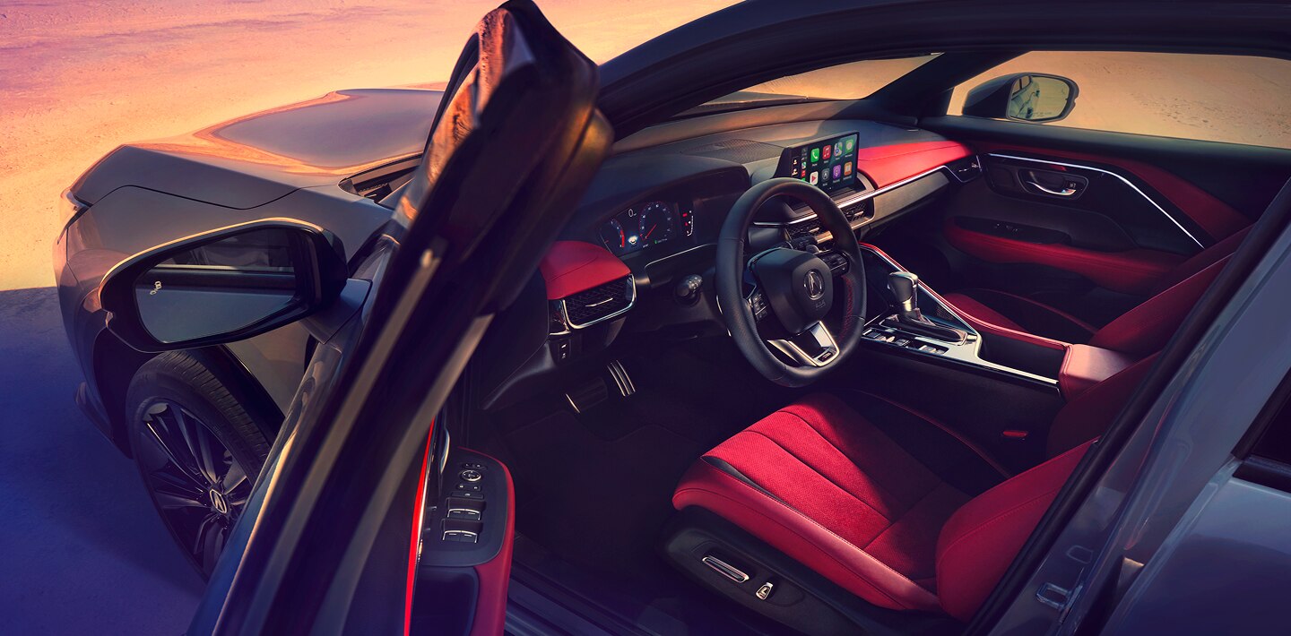 Medium shot of an open door revealing the interior. 