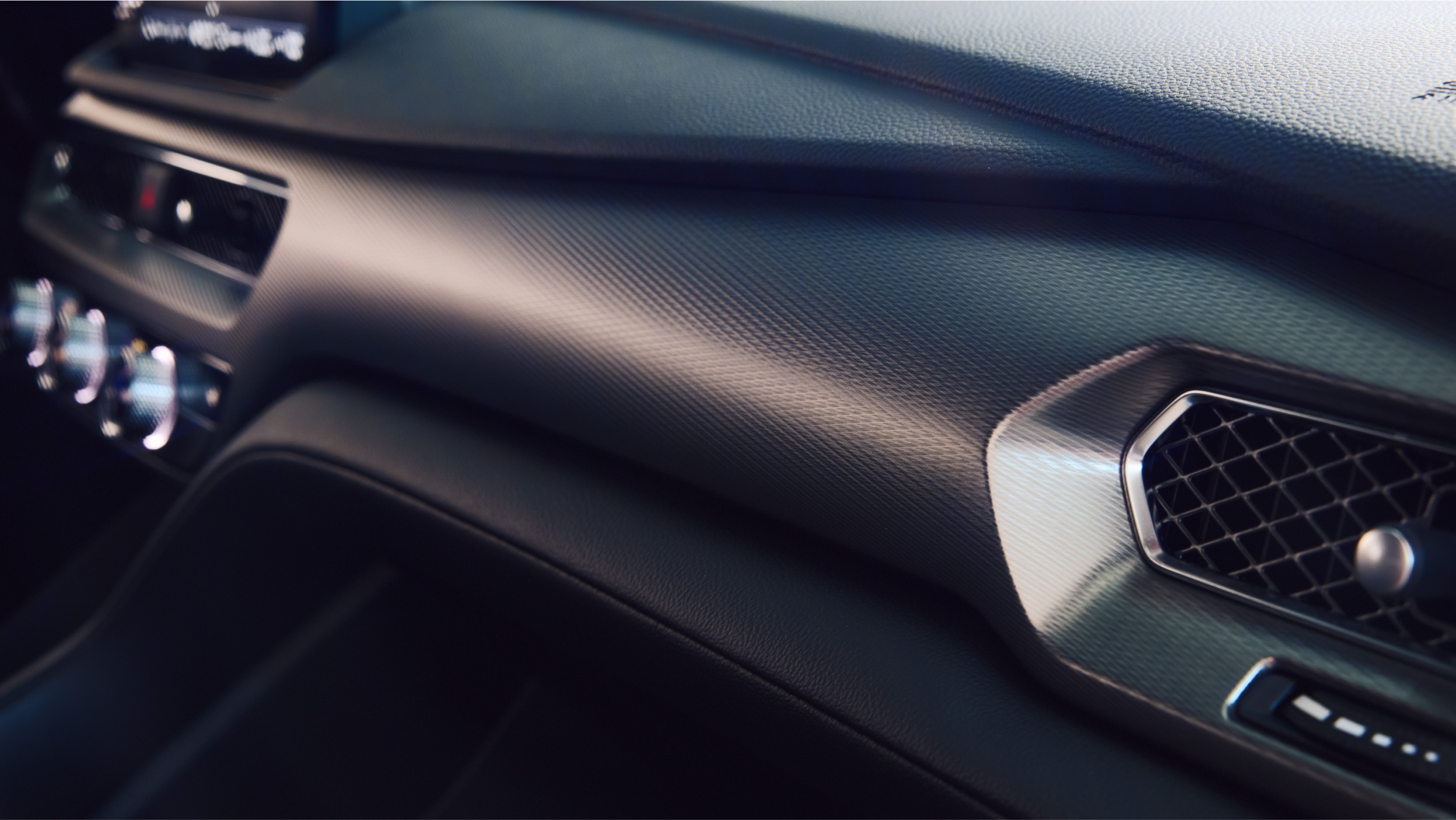 Close-up of 2023 Integra interior wireless charging pad, with smartphone, in 2023 Integra