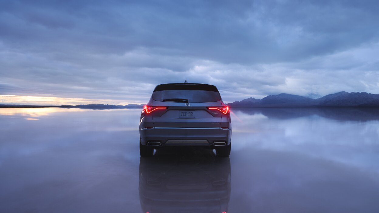 A close-up of a headlight on the MDX.