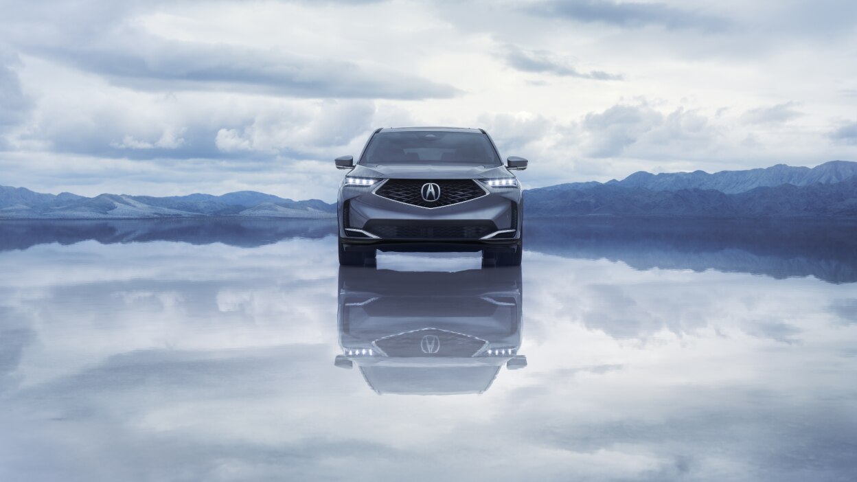 Side view of a purple MDX in a bright, stylish room