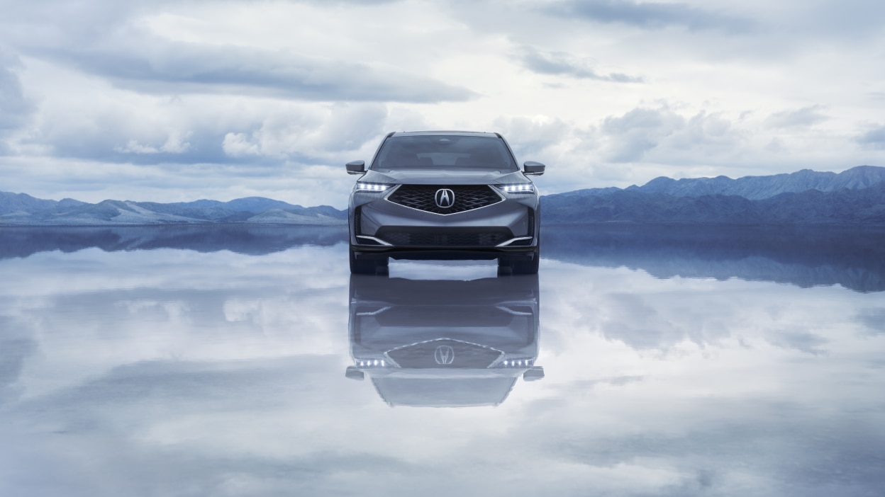 Side view of a purple MDX in a bright, stylish room