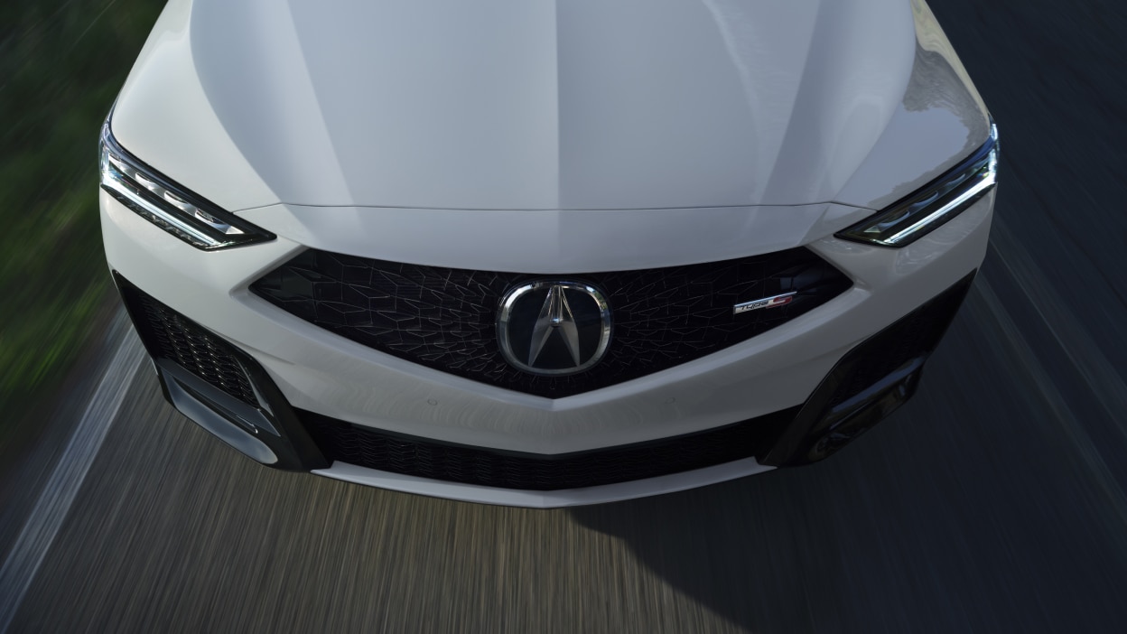 An overhead shot of the hood of a grey MDX.