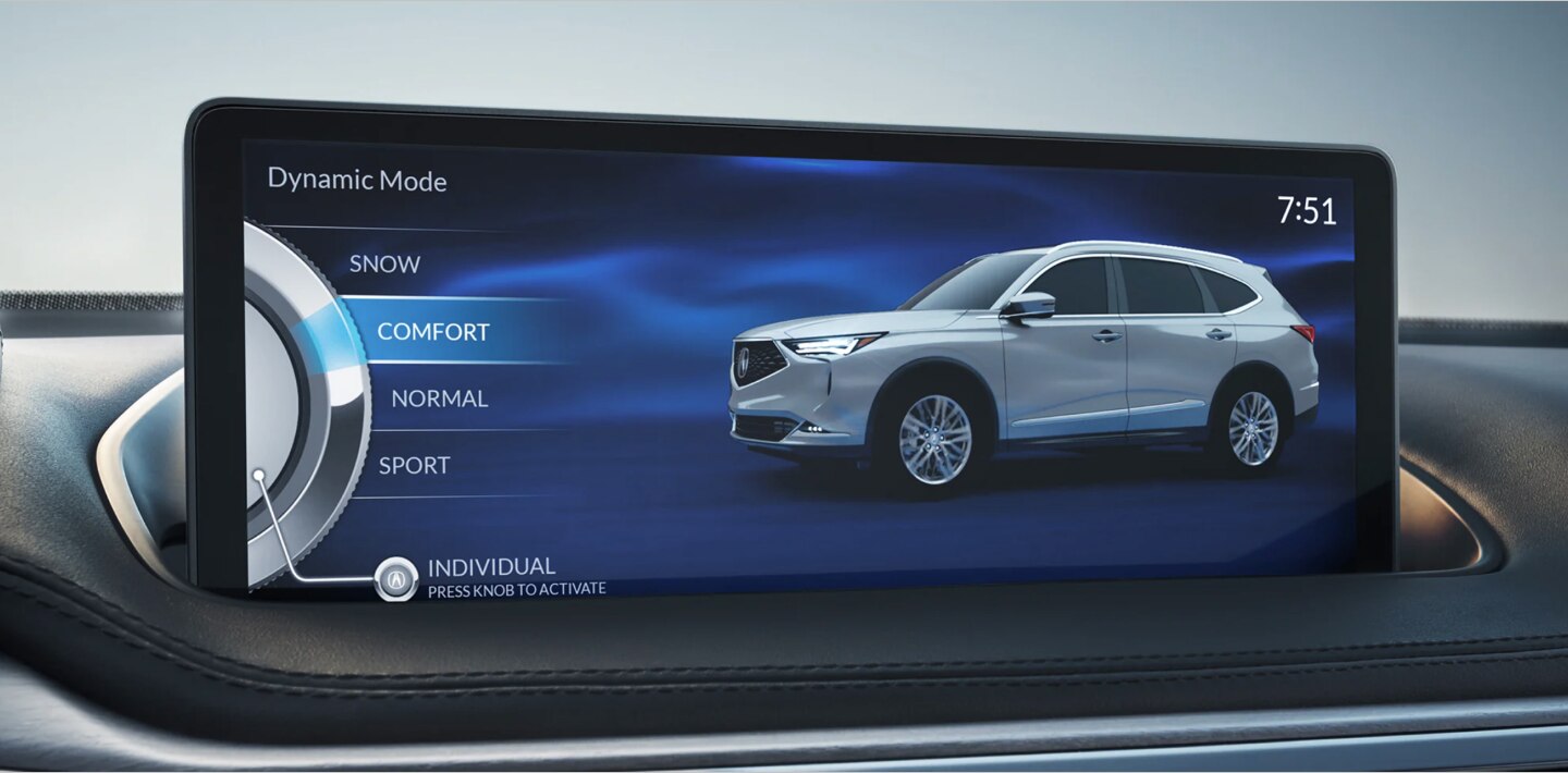 Close-up of the navigation screen in an Acura MDX displaying the different drive modes available to the driver. The mode “COMFORT” is selected and highlighted blue. Gros plan de l’écran de navigation d’un Acura MDX affichant les différents modes de conduite offerts au conducteur. Le mode « COMFORT » est sélectionné et mis en évidence en bleu.