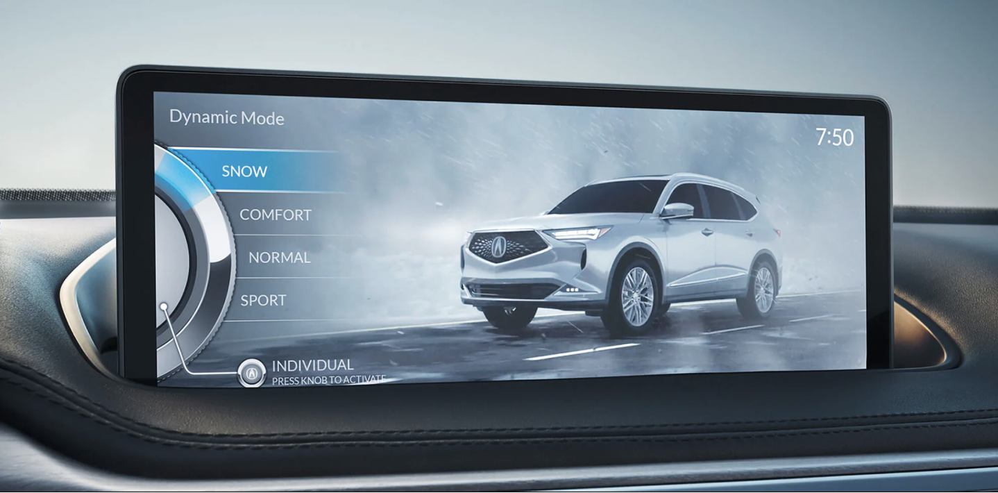Close-up of the navigation screen in an Acura MDX displaying the different drive modes available to the driver. The mode “SNOW” is selected and highlighted blue.	Gros plan de l’écran de navigation d’un Acura MDX affichant les différents modes de conduite offerts au conducteur. Le mode « SNOW » est sélectionné et mis en évidence en bleu.